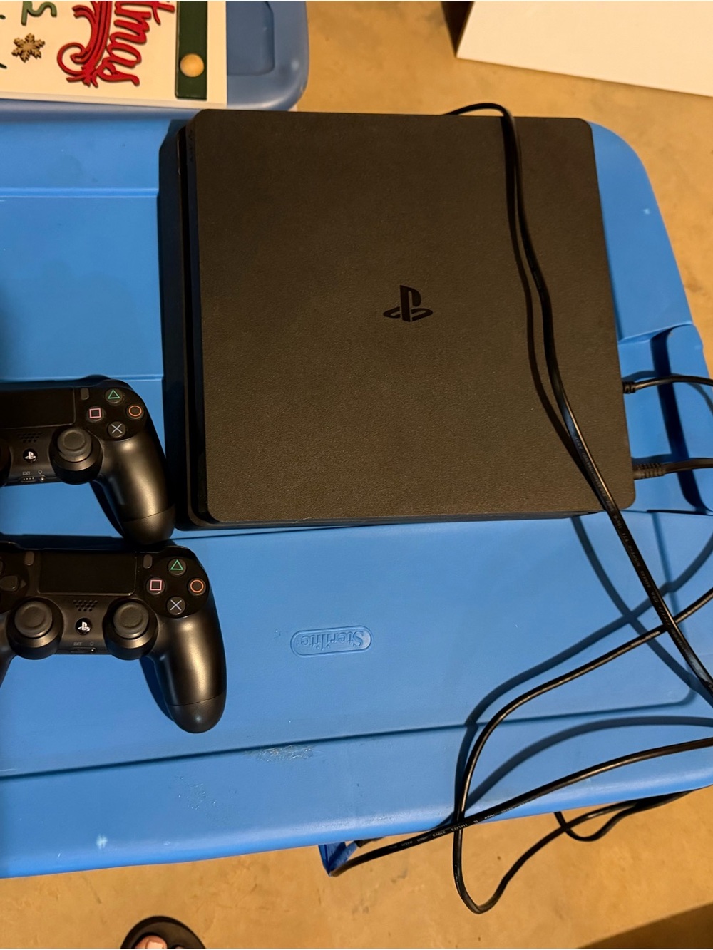 Sony Black PlayStation Slim Console with Two Black DualShock Controllers - Picture 1 of 2